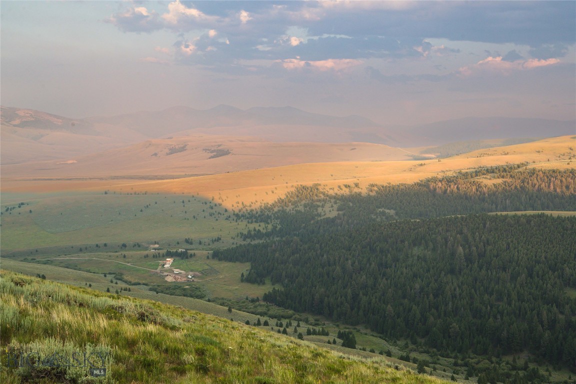 The Elk Canyon Ranch stands out as the best offering currently on the market in Montana, providing unparalleled quality and unmatched opportunities for discerning elk and big game hunters. This turnkey, top-tier elk hunting ranch is located in a general hunting district, offering the unique advantage of hunting both Idaho and Montana. Although nestled in the Beaverhead Mountains and surrounded by endless public land, the Elk Canyon Ranch is not off-grid—it offers power, fiber optics, and water from a spring.
The ranch encompasses 1,273+/- deeded acres of timber and pasture and is protected by a conservation easement, preserving its open spaces, wildlife habitat, and scenic beauty for generations to come. In addition, the property boasts 2.5+/- miles of Nip and Tuck Creek for trout fishing and four ponds throughout.
Within a short 30+/- minute drive, you’ll find the Lemhi River in Idaho or Clark Canyon Reservoir in Montana—the origin of the Beaverhead River and end of the Red Rock River. A 40+ minute drive brings you to the historic ghost town of Bannack, while less than an hour delivers you to Jackson or Elk Horn Hot Springs. For convenience, Leadore, Idaho offers basic amenities within 30 minutes, and Dillon, Montana provides expanded services just 50+ minutes away.
End-of-road privacy, plentiful water, abundant feed sources, and extensive public land access make this the ultimate elk hunting property. It is the unmatched seclusion and protected landscape of the Elk Canyon Ranch that truly separates it from the pack.