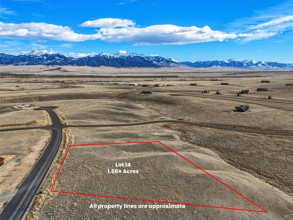 Lot 14 offers 1.58± acres within a thoughtfully planned 55-lot community, with parcels ranging from approximately 1 to 2 acres. The subdivision spans 165± acres total, providing generous open space and excellent opportunities to enjoy local wildlife. Paved roads are in place, with mailboxes, power, and fiber optic service to each lot. Lot 14 has a 15 GPM, 347 foot well. Located approximately three miles from downtown Ennis, this property offers sweeping views in all directions and convenient access to town amenities. The licensed Montana listing agent is a member of the selling entity.