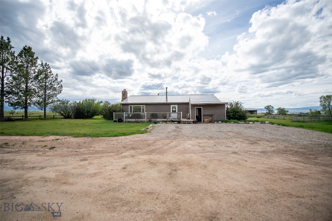MASSIVE MADISON RANGE VIEWS and room to breathe in the heart of the Madison Valley! Situated on 1 acre just outside Cameron, this spacious 4-bedroom, 3-bath home offers 2,738± square feet of living space and a front-row seat to some of Southwest Montana's most spectacular scenery.

Enjoy unobstructed views of Sphinx Mountain and the surrounding Madison Range from your deck while taking in the peace and quiet of country living. The home features a remodeled kitchen with dining area, a generous living room, a primary suite with private bath, and a partially finished basement offering additional living space, bedrooms, storage, and laundry area.

Outdoor enthusiasts will appreciate the property's proximity to Beaverhead-Deerlodge National Forest, world-class fishing on the Madison River, and endless opportunities for hiking, hunting, horseback riding, and recreation. Located just minutes from Cameron and a short drive to Ennis, this property offers an affordable opportunity to own a home in one of Montana's most sought-after valleys.