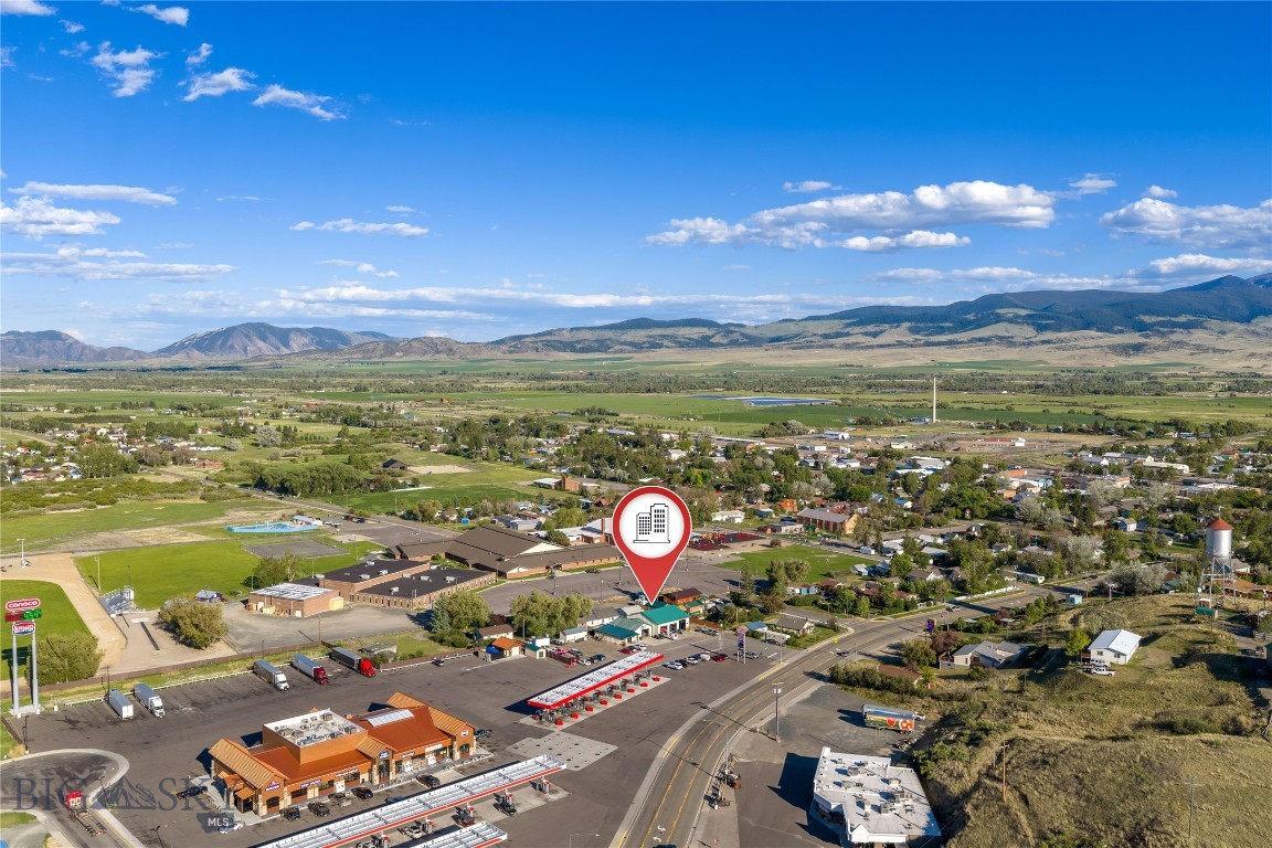 Turn-Key Automotive & Tire Business Opportunity---Take advantage of this rare opportunity to own a well-established, profitable automotive and tire business in the heart of Whitehall, Montana. With decades of proven success and a loyal customer base, this fully operational business is being offered as a true turnkey opportunity, complete with the real estate, business, and equipment.  The property features a professionally designed reception area, private office, ADA-compliant public restroom, private employee restroom, lunch/storage room, and three mini-split heating and cooling units. The insulated shop is built for efficiency with spray foam insulation, four service bays, and convenient rear access.  Designed to accommodate a wide range of automotive services, the shop is equipped with a 9,000-lb four-post lift, 30,000-lb heavy-duty lift, modern alignment system with lane departure calibration capability, extended-length rack, automatic load rack, tire bars, oil tanks, waste oil heating system, 80-gallon air compressor (approximately three years old), dedicated compressor room, tire storage areas, and extensive workspace inside and outside the building. The property also offers ample parking and additional storage space behind the shop.  The sale includes the business, real estate, and equipment, allowing a new owner to step in and begin operations immediately. The current owners are willing to remain for a negotiated transition period to help ensure a smooth transfer of the business.  Ideally located just 30 minutes from Butte and 45 minutes from Bozeman, this established operation offers exceptional growth potential in one of Southwest Montana’s fastest-growing corridors. Whether you’re looking to expand an existing automotive business or invest in a successful, long-standing operation, this is an outstanding opportunity.

Equipment included in the sale includes, but is not limited to:

-Four service lube bays
-9,000-lb four-post lift
-30,000-lb heavy-duty lift for service with center lift jacks
-Computerized alignment system with lane departure calibration capability
-18,000 lb extended length alignment rack with center lift jacks
-Waste oil heating system
-Oil tanks
-Tire equipment and tire bars
-80-gallon air compressor (approx. 3 years old)
-Existing shop equipment necessary for continued operation

This is a true turnkey business opportunity ready for its next owner to build on its outstanding reputation and decades of success.