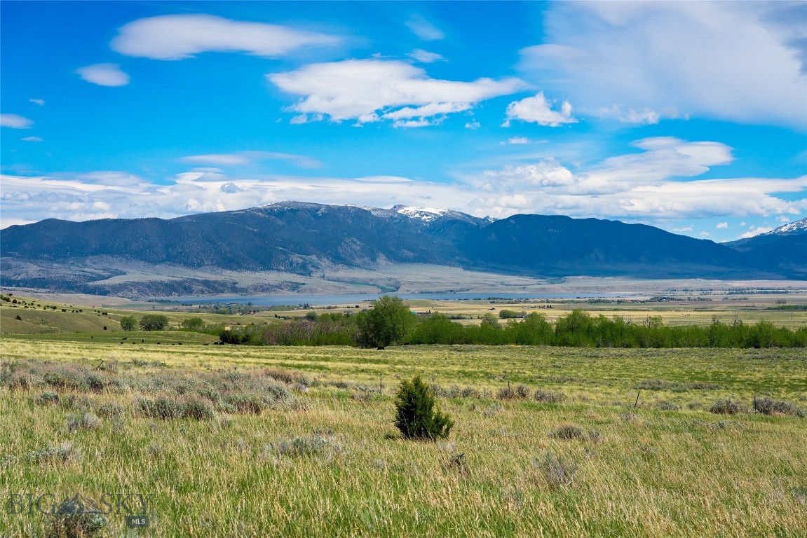Spectacular Mountain & Lake Views!! A rare opportunity to own a 4.0763± acre parcel in South Meadow Creek’s desirable Stone Ridge Views Subdivision. Undoubtedly one of the premier lots in the subdivision, this exceptional property captures sweeping views of Ennis Lake, the Madison Range and Valley, and the Tobacco Root Mountains.
Adjacent to 9± acres of open space to the south and open ranch land to the east, the property offers a spacious, private feel with protected view corridors and breathtaking scenery in every direction.
Located near National Forest access, the Madison River, and Ennis Lake, the area offers endless recreation, including hiking, camping, Blue Ribbon fishing, boating, ATV riding, horseback riding, and more.
Power and fiber-optic communication lines are to the property. DEQ approval and a designated building envelope are already in place, making this parcel ready for your Montana dream home. Covenants and established building envelopes help protect your investment.
The lively town of Ennis is approximately 20 minutes away, with Bozeman and Bozeman Yellowstone International Airport less than an hour away.