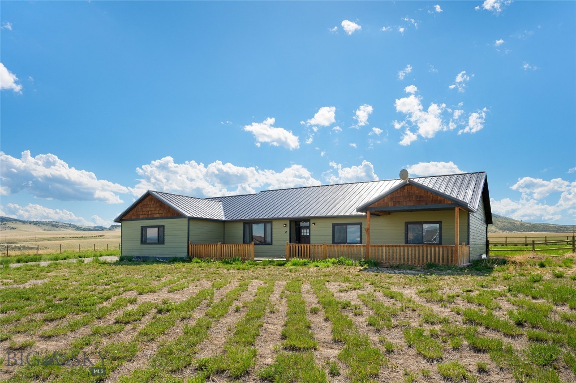 Wake up to mountain views and 3.25 acres of freedom! Built in 2018, this spacious 2,256 sq ft rancher with 3-bed and 2 baths offers seamless indoor-outdoor living with a front deck and covered back deck making it perfect for entertaining.  Highlights include a primary ensuite with a soaking tub, a dedicated dog-wash room in the oversized garage, a massive detached shop and horse-friendly covenants,  This home also boast of a new black top driveway, new underground sprinkler system, and new flooring throughout the home. Whether you’re hobbying in the large detached shop or exploring the nearby Copper City trails or Lewis and Clark Caverns this property is built for adventure. Sellers are offering $10k at closing to help you move in!