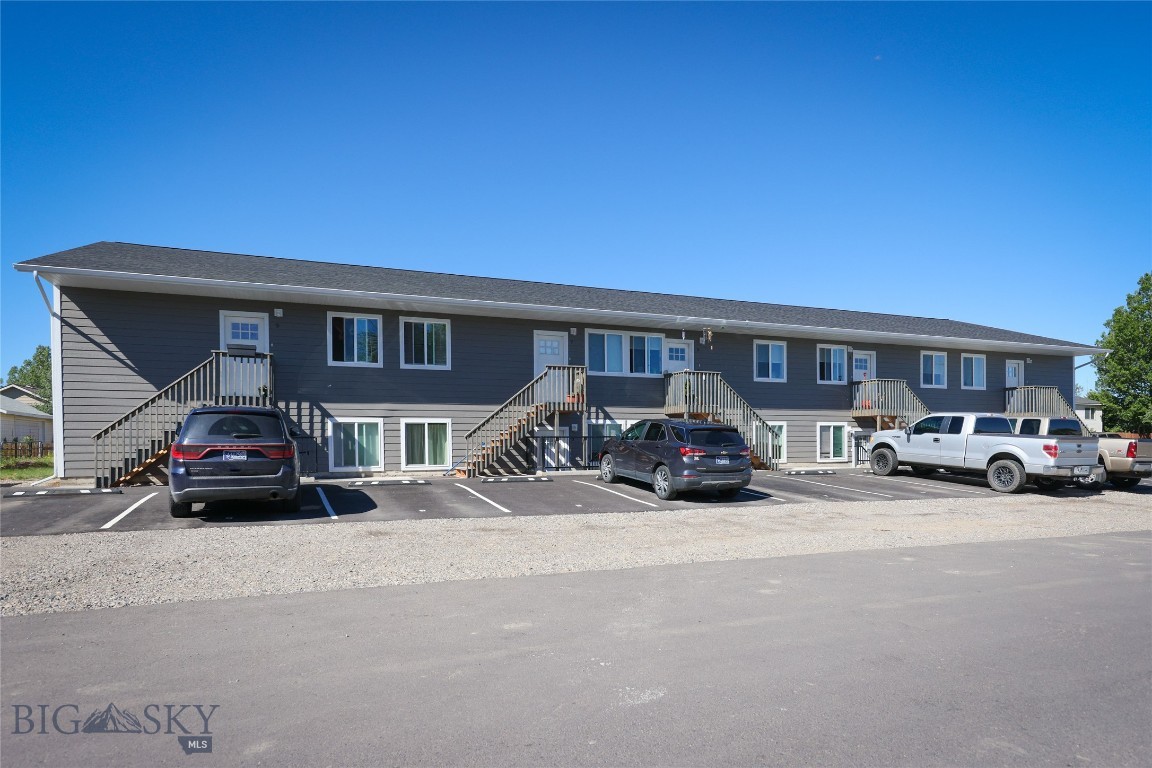 806 West Allison is a 10-unit multifamily property located in Belgrade, Montana. Built in 2001 and extensively renovated, the property sits on .34 acres zoned Community Living (CL) within Belgrade city limits. All 10 units are three-bedroom, one-bathroom floor plans averaging approximately 1,000 square feet each. The property is 100% occupied and generating $14,875 per month in gross rent. $178,500 annually.

The property has undergone a comprehensive renovation and capital improvements. Six of the ten units have been fully remodeled with new flooring, paint, cabinets, countertops, appliances, windows, doors, decks, blinds, toilets, and heater coverings. Select units received new mini-split heating and cooling systems and new water heaters. Units 7 and 8 have not been renovated.

At the building level, the roof, siding, and gutters have been replaced in their entirety. The attic above Unit 1 was restored and re-insulated, and the parking lot was resurfaced with new asphalt.