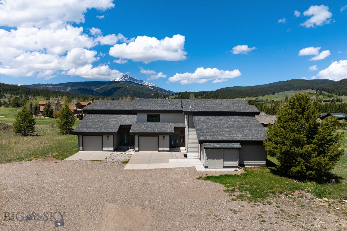 Located in Big Sky's desirable Meadow Village, this middle unit condo sits along the Big Sky Golf Course with unobstructed views of Lone Mountain.  This property offers convenient access to golf, Nordic ski trails, hiking, biking, fishing, dining, shopping, and world class skiing at Big Sky Resort.  Set on a quiet cul-de-sac, this property combines privacy with proximity to Meadow Village Town Center and presents an opportunity to own property that combines scenic views, recreational access, and lasting appeal in a premier resort setting.