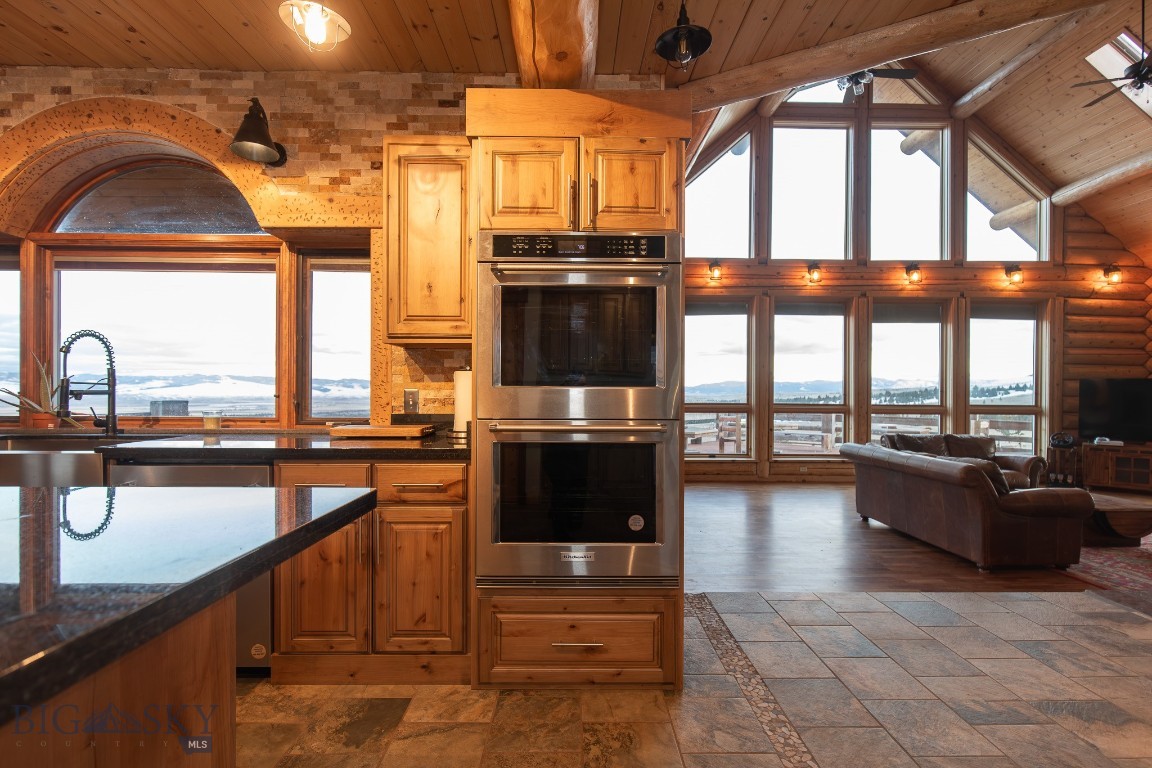 Escape to your own private mountain retreat with this stunning 5,400+ sq ft log home nestled on 30 breathtaking acres. Surrounded by nature and offering spectacular panoramic views, this 3-story home delivers the perfect balance of rustic charm and tasteful updates.

Inside, you’ll find 5 spacious bedrooms, 3 bathrooms, and expansive living spaces designed to capture the beauty of the outdoors. Massive windows flood the home with natural light while framing the incredible mountain scenery. Each level features its own cozy fireplace, creating warm and inviting spaces to relax year-round. The home has been thoughtfully improved with updated electrical and plumbing, along with a brand-new kitchen that blends modern convenience with timeless mountain style.

Step outside onto the large deck and take in the sweeping views and unmatched privacy this property offers. The 30 acres provide incredible recreational opportunities, including prime hunting ground and endless space to explore.

Additional features include a shop, attached garage, and plenty of room for equipment, toys, or hobbies.

A rare opportunity to own a true mountain escape with space, privacy, and unforgettable views.