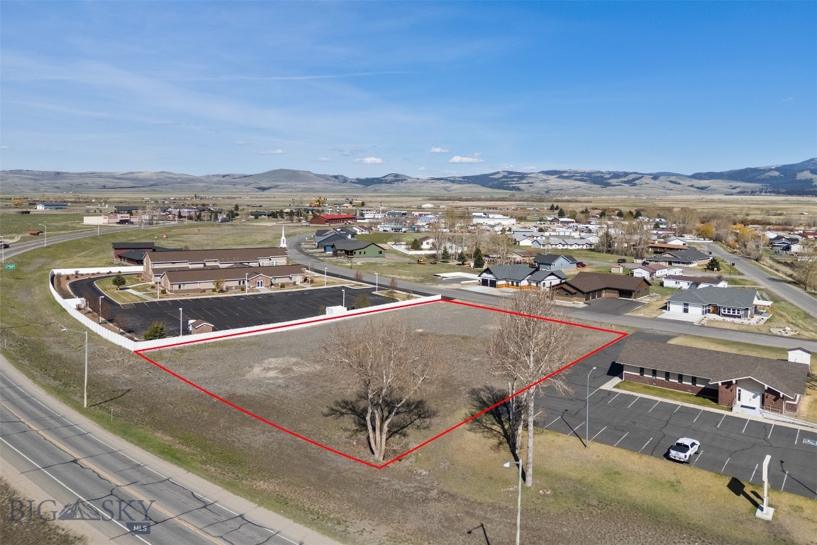 Unlock the potential of your business with this exceptional-level 1.15 - acre commercial lot located in the highly sought-after Warren Acres subdivision. This versatile property offers a strategic location with high visibility and easy access, making it ideal for a variety of commercial ventures. This lot offers ample square footage to accommodate your business needs, and all necessary utilities are readily available, streamlining the development process for your new adventure. With Deer Lodge's growth trajectory, this lot presents a fantastic investment opportunity for long-term appreciation and success. Don't miss your chance to secure this prime commercial space. Whether you're looking to expand an existing business or start a new venture, this location is poised for success!