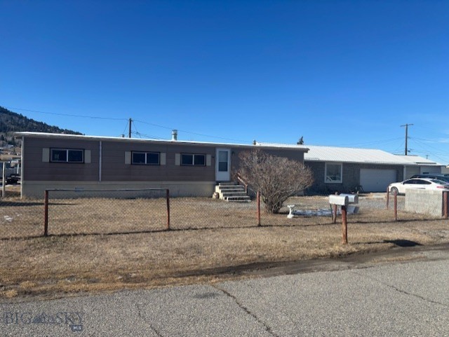 Unique property situated on 5+ city lots. 3 bedroom and 2 bath manufactured home sits on concrete slab foundation. Property needs some interior TLC but home is solid. Attached 2 car garage with 1 bedroom and 1 bath apartment. Large newer storage shed included. Lots of investment opportunity with this property.