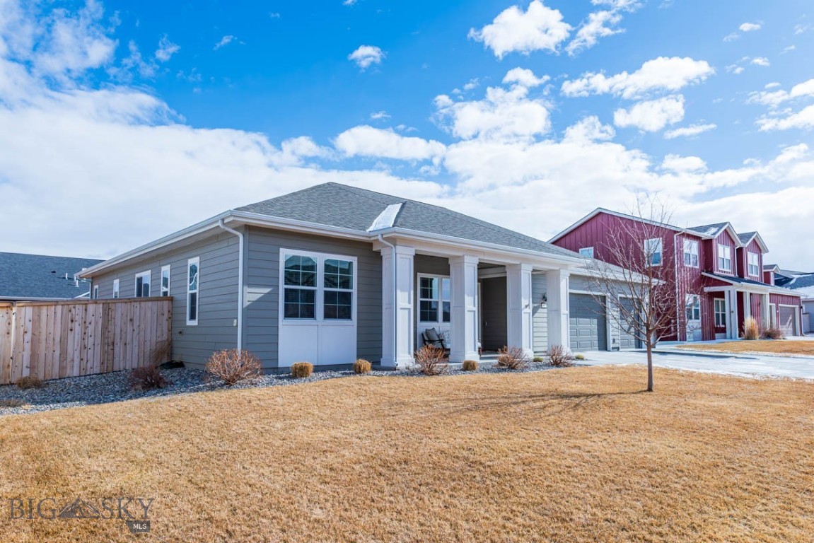 Welcome home to this beautifully maintained 4-bedroom, 2 full bath, 1 half bath residence in the heart of Belgrade, Montana. Designed with comfort, functionality, and timeless style in mind, this single-family home offers the perfect balance of classic character and modern convenience—all in a location that keeps you close to everything the Gallatin Valley has to offer.

Upon entry via the covered front porch you’ll appreciate the tall ceilings and abundance of natural light that create an open, airy atmosphere throughout the main living spaces. Large windows invite Montana’s big sky indoors, enhancing the home’s warm, welcoming feel. The thoughtful layout provides a seamless flow between rooms while still offering defined spaces that make everyday living comfortable and practical.

At the center of the home is the open-concept kitchen, living, and dining area—designed for gathering, entertaining, and enjoying daily life. The kitchen is both stylish and functional, featuring solid surface countertops, stainless steel appliances, and a massive island that anchors the space. Whether you’re preparing meals, hosting friends, or helping with homework, the oversized island provides generous workspace and seating. A large pantry offers abundant storage, keeping everything organized and within reach.

The home features four well-sized bedrooms, including a comfortable primary suite with a private full bath that includes a large tub, tile walk in shower and generous walk in closet. An additional full bathroom and a convenient half bath ensure plenty of space for family and guests. Each room offers flexibility for bedrooms, guest quarters, or a home office.  All interior walls are sound proofed for quiet enjoyment. 

Forced air heating and cooling provide year-round comfort, while the home’s energy-efficient design helps keep utility costs manageable. Thoughtfully built and easy to maintain, this property is ideal for those seeking both convenience and long-term value.

Outside, the fenced backyard offers privacy and space to relax, garden, entertain, or let pets play freely. The 3-car garage provides ample room for vehicles, storage, and all your Montana gear.

Located close to Belgrade schools and just minutes from the airport, this home combines neighborhood charm with everyday convenience. Wonderfully cared for and move-in ready, it’s a standout opportunity to enjoy comfortable living in the heart of the Gallatin Valley.  Agent related to seller.