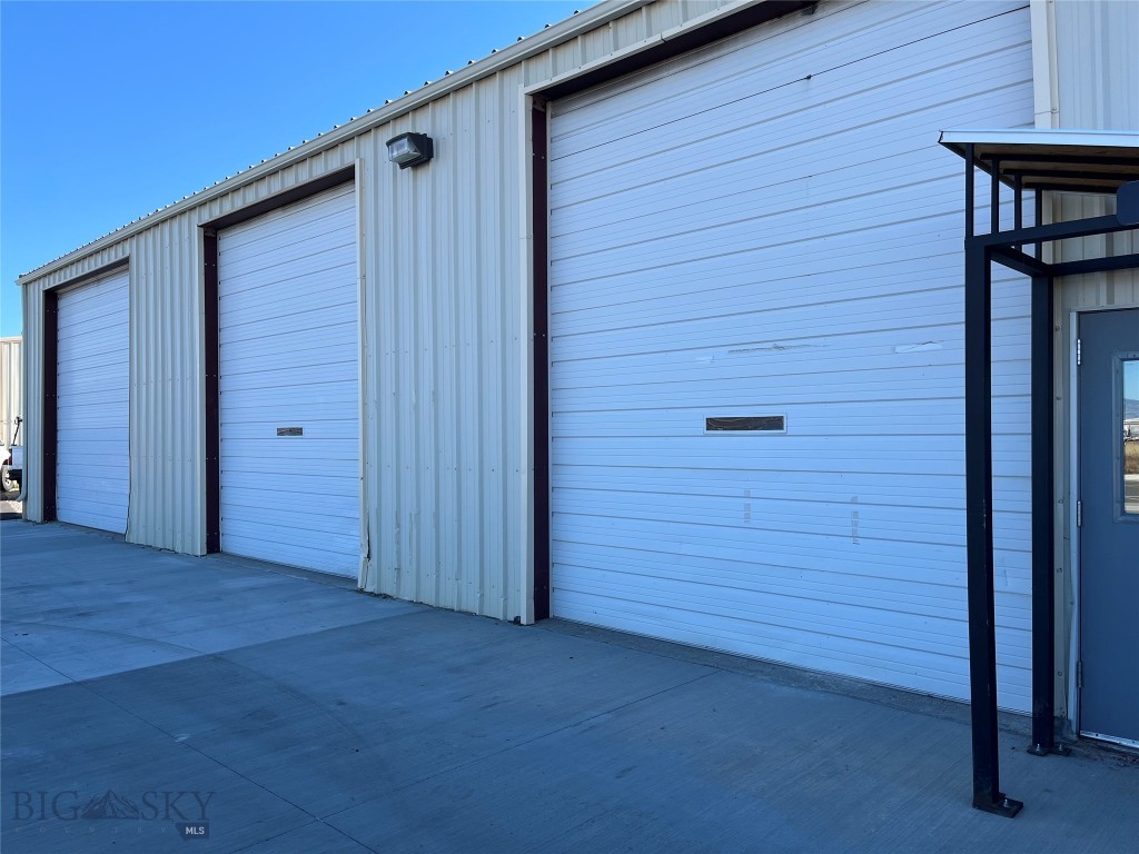 Almost 3,000 SF of warehouse with three 14' overhead doors and potential access to yard space. Overflow parking available on site. 1,387 SF of office/ conference/training space plus kitchen/break room and bathrooms. This space is easily variable and perfect for a manufacturing or light industrial tenant. AC in upstairs offices. Gross lease covers snow removal and road/parking maintenance. Fantastic location right off of Jackrabbit, close to the new Jackrabbit Crossing development. Potential to remove offices to allow for additional warehouse or flex space.