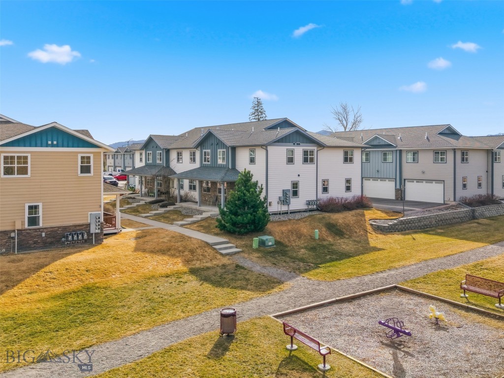 Welcome to 4348 Glenwood Drive, Unit #C, a well-kept 3-bedroom, 2.5-bath condominium in Bozeman’s Flanders Creek community. Built in 2017, this 1,312± sq ft multi-level home offers a practical layout, clean finishes, and easy access to some of the area’s most loved neighborhood amenities.

The main level features an open-concept living, dining, and kitchen area with hardwood floors, a gas fireplace, and plenty of natural light. The kitchen is equipped with granite countertops, a functional attached island with seating, and a full appliance package including range, microwave, dishwasher, refrigerator, washer, and dryer. A convenient half bath and access to the attached 2-car garage complete the main floor.

Upstairs, you’ll find three bedrooms, including a spacious primary suite with walk-in closet and full bath, plus an additional full bath and laundry area for everyday convenience.

Outside, enjoy a covered front porch, patio, and landscaped surroundings. Community features include sidewalks, trail access, park space, and pond/river amenities nearby, making this a strong option for anyone seeking low-maintenance living with neighborhood connectivity.

The monthly HOA of $350.61 includes exterior maintenance, garbage, insurance, road maintenance, and snow removal for common area and common elements.