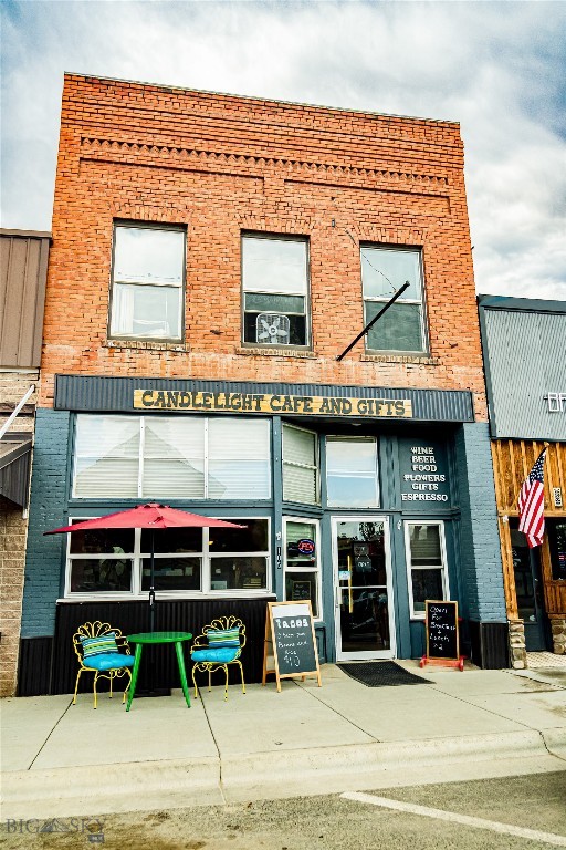 Located right on Main Street in the heart of Sheridan, this versatile property offers outstanding visibility and steady exposure to both local residents and travelers passing through the scenic Ruby Valley. With its welcoming storefront, large front windows, and bright interior, the space is well-suited for a wide range of business ventures—retail, office, studio, or creative enterprise—the possibilities are truly open-ended. An air conditioning unit keeps the main space comfortable year-round, while the layout provides flexibility for a variety of uses. Adding even more value is the attached approximately 900-square-foot apartment featuring 2 bedrooms, 1 bathroom, hot water radiant heat, and a dedicated laundry room. This residential space presents an excellent opportunity for rental income, on-site living, or a live/work arrangement. Whether you're an investor, entrepreneur, or someone looking to bring a new vision to life in a charming small-town setting, this property is full of potential and ready for its next chapter.