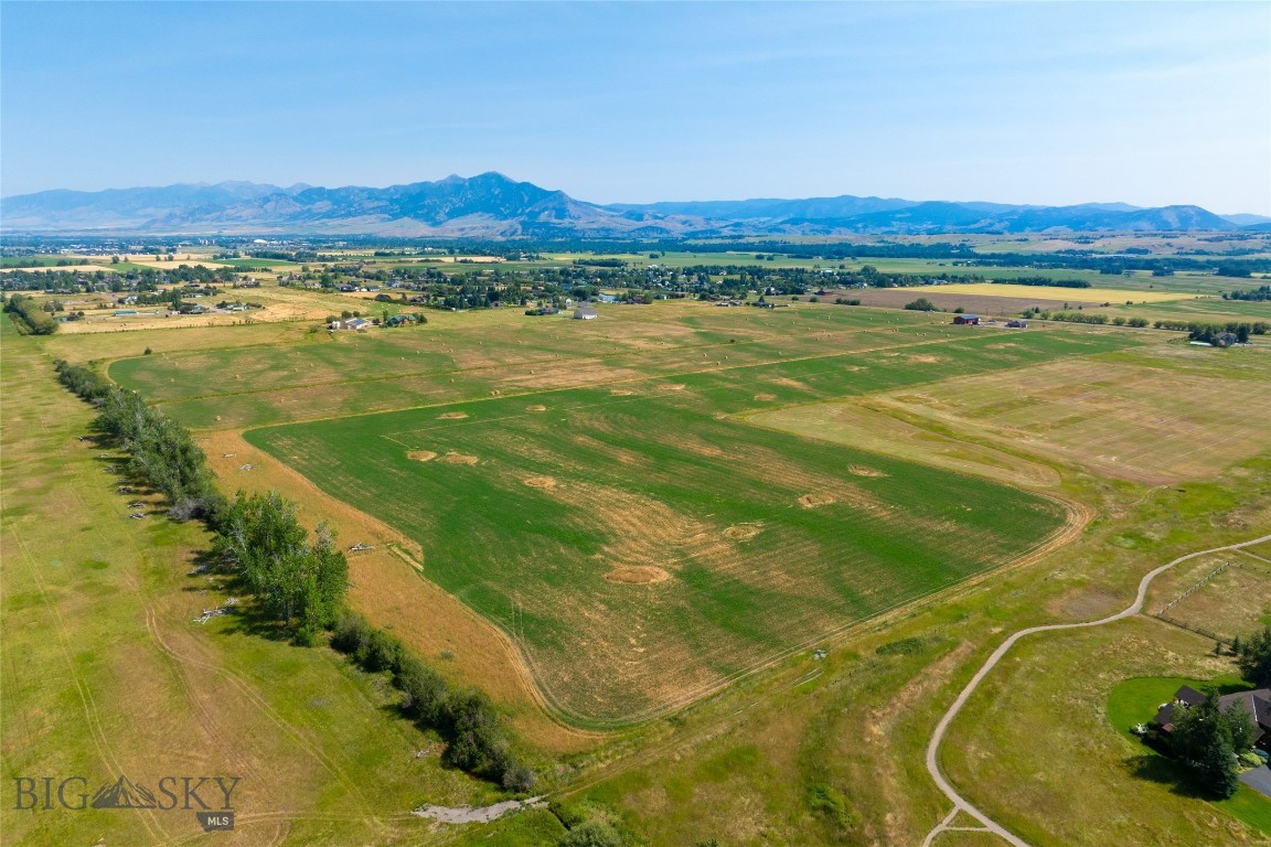 Welcome to The Summits, the premier subdivision located in the prime Southside of Bozeman near the breathtaking Hyalite Canyon. We are excited to introduce you to this exceptional community and provide you with all the information you need to reserve your lot and build your dream home in this extraordinary neighborhood. The Summits spans 50 acres of beautifully designed landscape, featuring lots over an acre in size, offering ample space and privacy. This premier location provides stunning views of the Bridger Mountains and the surrounding valley, creating a serene and picturesque setting. Located just ten minutes from Main Street Bozeman, Montana State University, and Bozeman Health, The Summits offers convenient access to all the amenities and attractions of the area. One of the highlights of The Summits is the community pond, a tranquil feature that enhances the neighborhood's charm and provides a peaceful retreat for residents. The community includes 30% open space, preserving the natural beauty of the area and supporting local wildlife, riparian habitats, and native plant species. An extensive network of interconnected trails winds through. Whether you're casting a line in pristine waters, carving fresh powder, tackling challenging bike trails, or hiking scenic routes, you'll find endless opportunities for outdoor adventure right at your doorstep. After your adventures, come home to The Summits, where you can relax and enjoy the peace and tranquility of your surroundings. The Summits has been thoughtfully designed to harmonize with the natural landscape, ensuring a seamless integration of the community into its stunning surroundings. This careful planning creates a unique living experience that combines luxury, privacy, and a deep connection to nature.