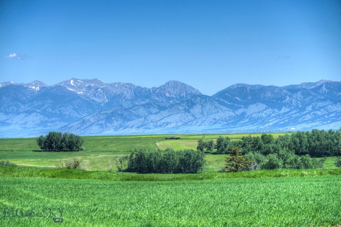 Misty Creek Ranch presents The Peak! Ascending a gentle hill, the 80 acre landscape unfolds before your eyes, revealing panoramic views of majestic mountains and sprawling valleys.  A newly paved road winds up to this stunning property that offers endless opportunities. Overlooking serene creeks, tranquil ponds, and expansive valleys, this land is a rare gem with limitless potential.  A 20 minute drive to Downtown Bozeman, 30 minutes to the international airport, and 40 minutes to Big Sky world-class resort. The Peak is part the 241 acre Misty Creek Ranch, also available for purchase, offering unparalleled beauty and boundless potential.
