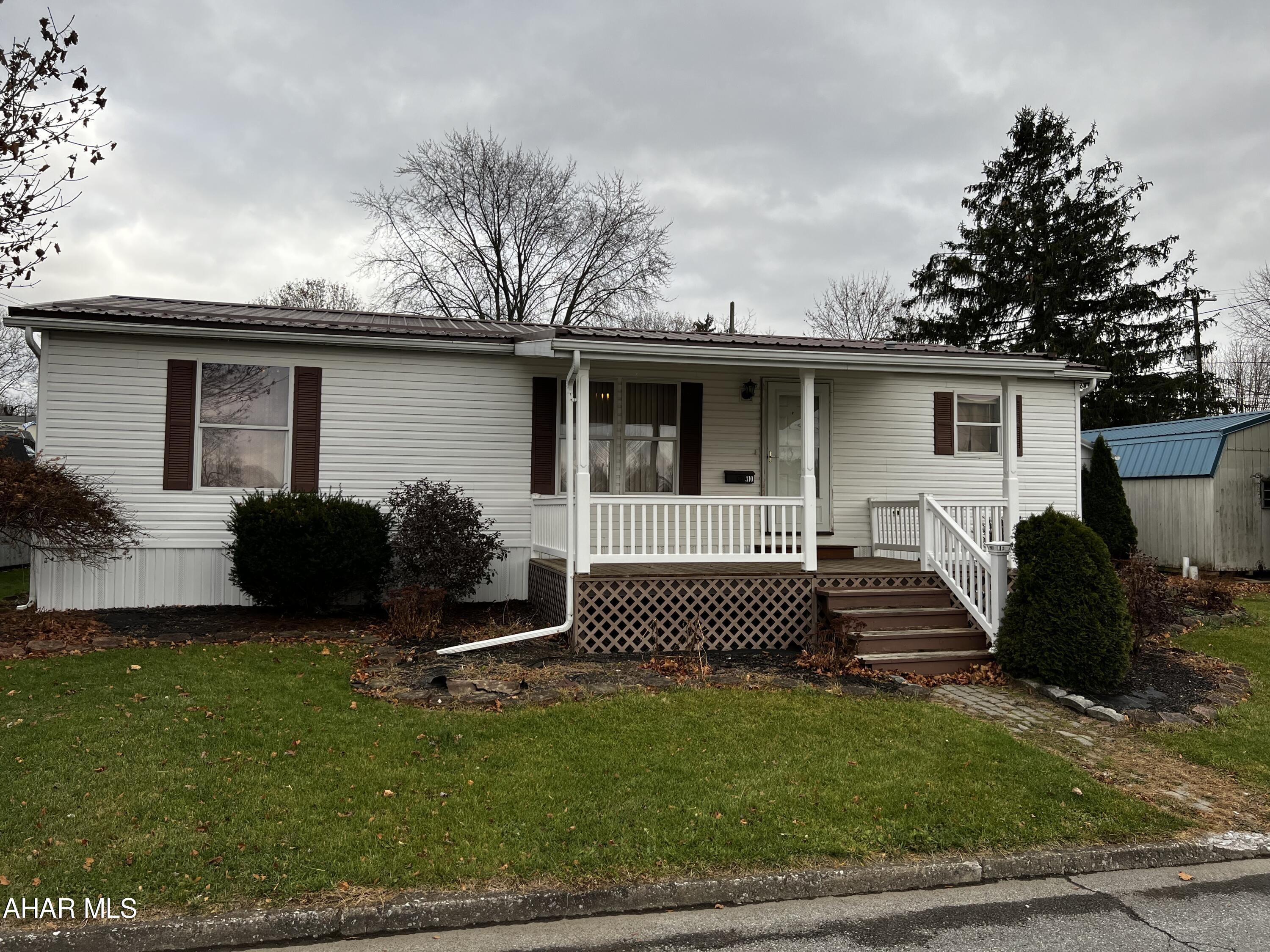Get Cozy in the Cove. Enjoy convenient 1 story living in this 2 bed, 2 bath mobile home on leased land. Make yourself at home with this open floor doublewide with a cozy feel in the beautiful Martinsburg community. Call for your tour today!