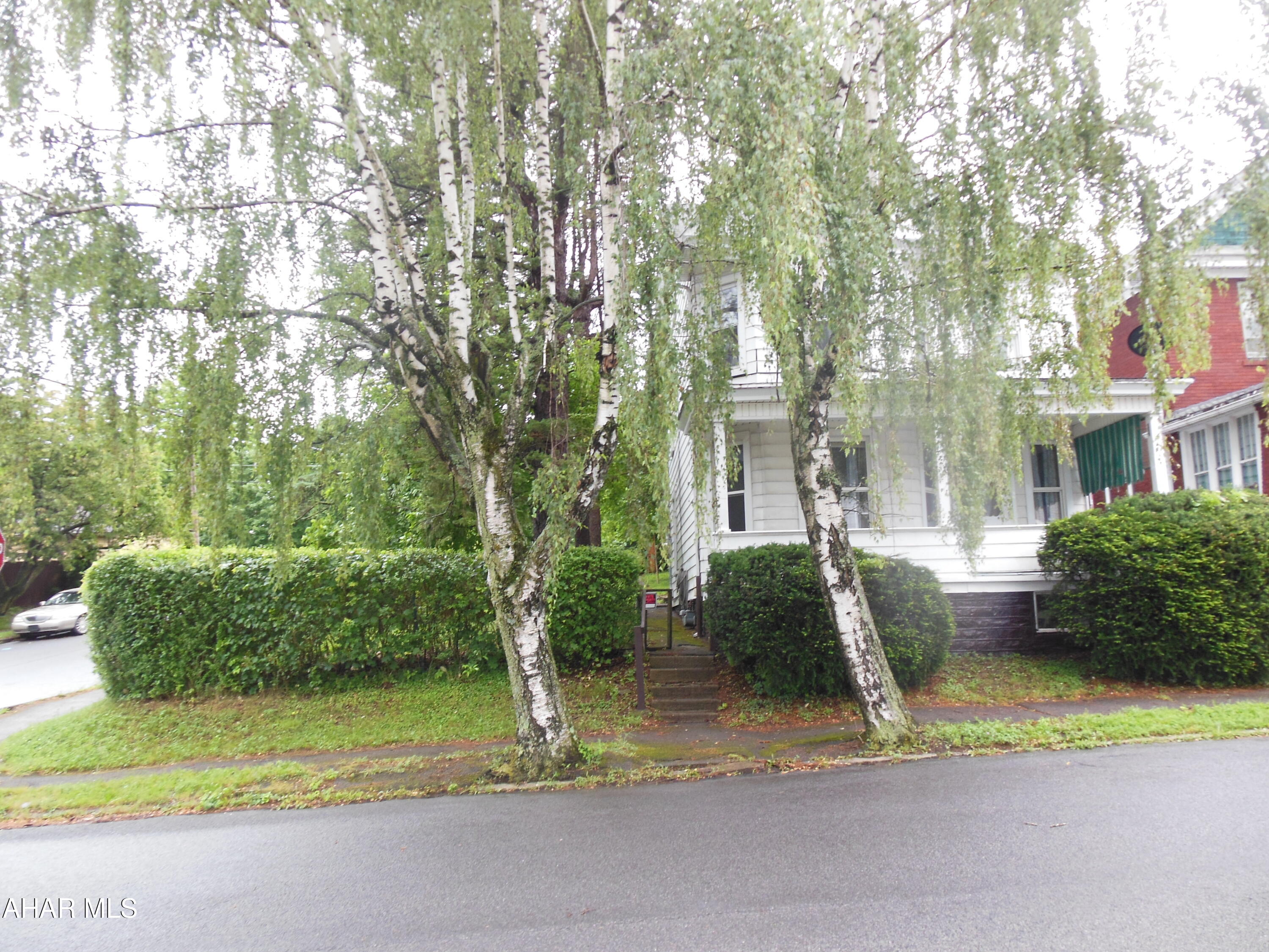 Good 3 - 4 BR home on a double corner lot with hedges for privacy. 100 amp breakers, GFA furnace, FP (Gas) & 2nd floor laundry. Great home to make your own.