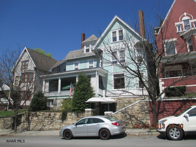 Charming Pattern Book Victorian home in the downtown area.  3 story home, spacious rooms, updated mechanics, Oak woodwork and oak hardwood floors. Built in cabinets, beveled glass doors, 2 kitchens, screened porch, and 2nd floor laundry. Possible student housing as this is in the RED ZONE.