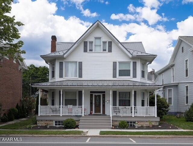 Step inside this warm and inviting 4 bedroom, 1.5-bath home — with potential for a 5th bedroom.  Fall in love with the character and comfort it offers. Gleaming hardwood floors adding timeless charm, while a cozy pellet stove and mini splits ensure year-round comfort. With oil hot water baseboard heat and updated systems throughout, this home combines classic appeal with modern efficiency.

The spacious main level features a convenient first-floor laundry and a bright, functional layout perfect for everyday living. Upstairs, the generously sized bedrooms are complemented with large closets and  a walk-up attic that offers excellent storage or could be transformed into additional living space.

Out back, you'll find an oversized two-car garage with plenty of room for vehicles, hobbies, or workshop space. 

Don't miss your chance to make this flexible and feature-packed home your own!