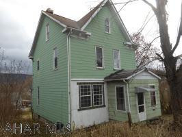 This is a Fannie Mae Homepath property. This is a 2.5 story home in Juniata. This home features a large lot of 0.3 acres. The entry into the home from the front is through an enclosed porch for convenience. The main floor features a living room, dining room, kitchen and den/office with additional entry from the rear porch. The second floor has three bedrooms and a full bath. The attic is a walk up that is currently used for storage. This space could be used for living area if heat is run to it. With some custom touches, this house could be your home