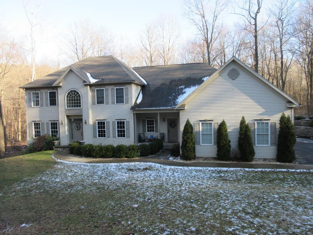A rare find in Castle Farms - Luxurious 2 story home on 26 wooded, private acres can be all yours. Features 4 large bedrooms each with its very own private bathroom suite and walk-in closets. The main master bedroom suite is luxurious with whirlpool tub, stand-up shower, double sinks and huge walk-in closet. Downstairs you will find an absolutely beautiful eat-in kitchen with center island and dining area, plus separate formal dining room, formal living room, family room, den/office, landry room and two half baths. 3 car attached garage, large concrete rear patio. Oil forced air/hot water "Aquecoil" heating system, pex plumbing system and 400 amp breakers. This is the opportunity you have been waiting for! Wooded privacy with in-town convenience! Be sure to check it out.