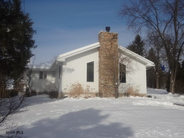 Great ranch home in Bellwood school district.  Large 60 x 316 Lot with 3 bedrooms, 2 bathrooms.  Very large Great room with fireplace.  Large 2.5 car detached garage.  Completely finished basement.  Home is waterproofed and guaranteed by Mihalko's.  Hardwood floors, central air.  Furnace is 3 years old.