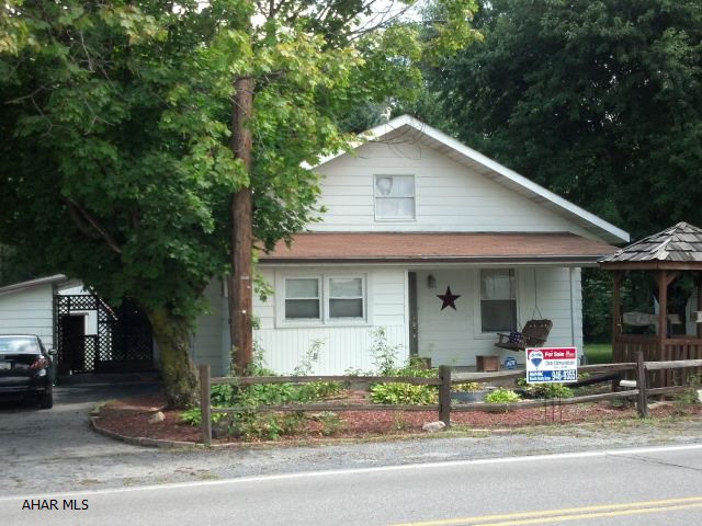 Easy 1 story living - move in condition, large, flat, fenced lot, trout stream to rear, det. large  1 car garage, additional storage sheds. Really nice package - low taxes! cONVENIENT LOCATION! Motivated Seller! Agent is relative of owner.