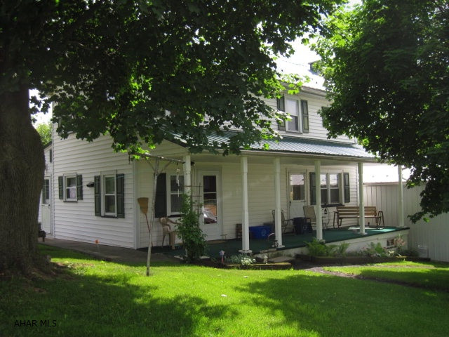 Home is set on a flowing .91 of an acre. Newer metal roof and vinyl siding(2015). Features a newer kitchen (1997), full bath remodeled (2011), den/office with unique woodwork. Living room, 3 nice bedrooms with a full bath. Unfinished walk up attic provided for storage. Two car detached garage. Integral one car garage with laundry room. Unfinished full basement. Walking through this house you will see it is in need of painting and finishing touches, this house has much to offer.