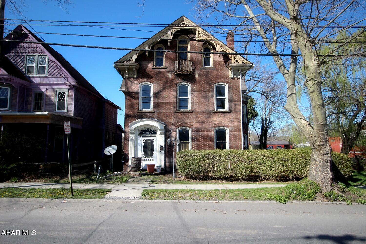 This stately brick Victorian offers timeless charm and a golden opportunity for restoration. With 3 spacious bedrooms on the second floor, 2 additional bedrooms in the attic, and a bonus room on the main floor perfect for a home office or additional bedroom, this home offers flexibility and space for all your needs. Original architectural details, tall ceilings, and solid brick construction set the stage for a stunning transformation. Ideal for investors, flippers, or anyone looking to craft their dream home with historic character. Bring your vision and breathe new life into this grand old beauty!  This property is eligible under the First Look Initiative which expires after 30 full days on market. No investor offers until first look period expires.  No offers regardless of buyer type will not be negotiated within the first 7 days of listing.