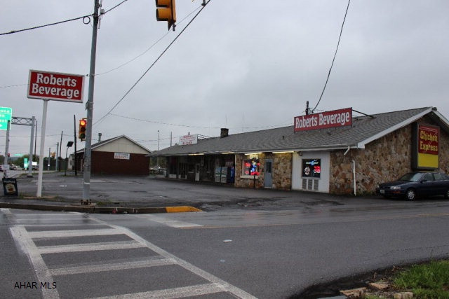 Clean Environmental study on file.  This is one of the busiest intersections in the entire county. Car wash with 4 bays.  Main building has 3 units.  Main space was a beer distributor with lots of retail space and multiple walk in coolers. Priced to move.