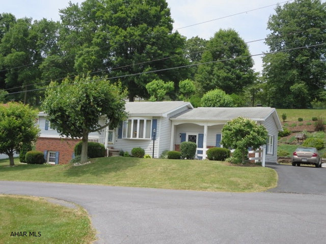 Always popular rancher offers one floor living in nice neighborhood just outside of Bedford Borough. Large main level family room with fireplace, includes large basement family room as well. Central A/C, city water and sewer. Kitchen opens onto large, private deck. Main level laundry room. All appliances included.
