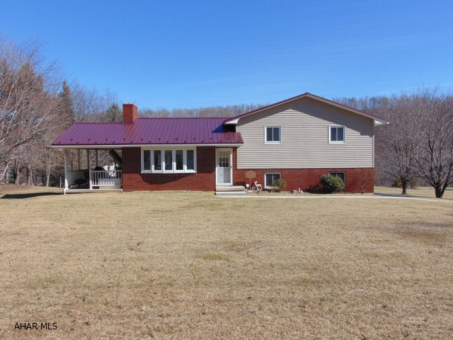 Move right in to this split-level home on an acre of rolling lawn.  Meticulously kept inside and out!  3 bedrooms, 1.5 bath, finished basement, central air, oil heat with 3 back-up heat sources.  Maintenance free decking, newly sealed black top driveway, new roof and a vinyl/brick exterior.  All appliances included!