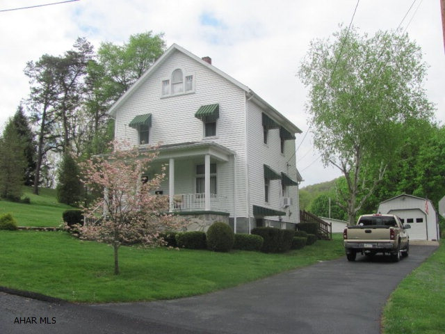 This home has recently went through several very nice remodeling projects including fresh painting. The hardwood floors have been refurbished in the Living Room and Dining Room. New Laminate flooring was installed in Kitchen area, Laundry and Back Foyer. New carpeting throughout the upstairs bedrooms and new Laminate flooring in the Bathroom area. New Baseboard trim has installed throughout the entire house. The oil furnace system has been serviced and updated to increase fuel efficiency. This is a very nice, solid and spacious home for the price. The home is located in a quiet low traffic area on the edge of Stonerstown. Located one block from the playground and a short distance from the Elementary School. The home sits on a large corner lot and includes a one car detached garage