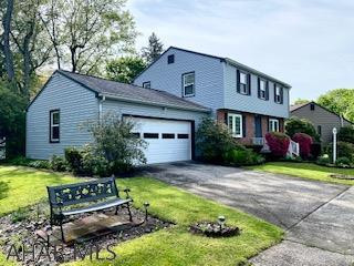 Charming 2 story in desirable Mansion Park area.  Hardwood floors in living room, dining room & bedrooms.  3 bedroom, 1.5 baths.  Nice large lot, 2 car garage and back patio for summer entertaining.  Lots of natural lighting throughout this house.  This property has been listed below recent appraisal for a quick sale.  In this location - this house won't last long!