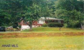 Brick Ranch, approx 1+/- acre, central air Mint condition, private level lot, new country kithcen, 4BR, 2BA, private road, right of way, generator negotiable, shed, new windows, central air