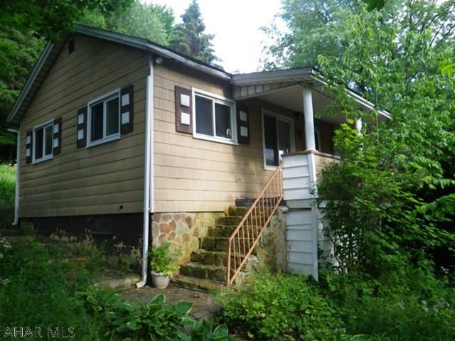 Barr Twp; 371 Oil Tank Hill Road- 2 BR handy man special on 1 lot. Updated kitchen, DR, 1 1/2 baths Oil HW heat. Basement, porch, driveway