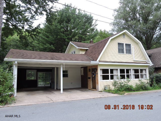 Bring the outdoors in through 2 heated sunrooms & a florida room.  Tons of natural light and views overlooking the big yard & beautiful specimen tree.  Well thought out additions add a big 1st floor laundry/mud room and large 1st floor bath with roll-in shower. Nicely laid out oak kitchen with appliances opens to the rear sunroom/breakfast area.  Newer furnace with central air & electronic air cleaner. 8'5 x 12 heated office with outside entrance in basement. This is a super house that won't last long.  Reassessment value is $151,800 with estimated taxes of $1903.  Seller is not appealing.