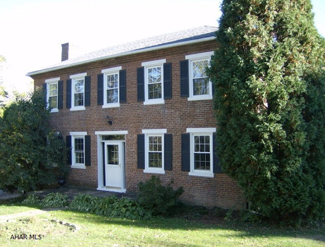 2 story remodeled, 4-5 BR 1860's farmhouse on 3.81 acres in Cambria Twp. Private setting, hard coal HW heat. Remodeled kitchen with fireplace, newer windows and floor coverings.