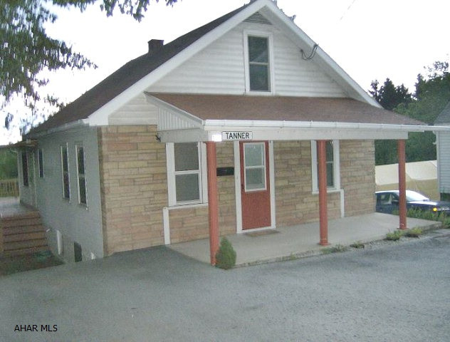 Ebensburg-3-4 BR stone & vinyl sided Cape Cod on nice lot with great view! Remodeled kitchen  with wrap around deck & great view!.