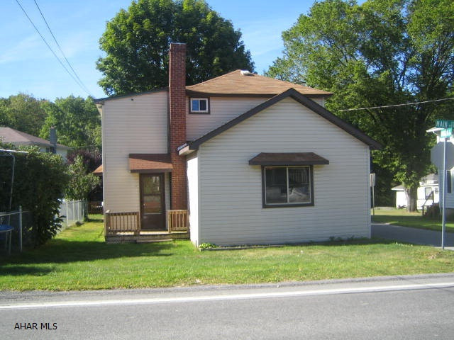 Vinyl sided 2 Story in Robertsdale in need of TLC, but could be perfect with your hard work and imagination. Large living room, eat-in kitchen with large dining area, first floor family room. Nice area. Off street parking. AS-IS sale. Seller will make no repairs.