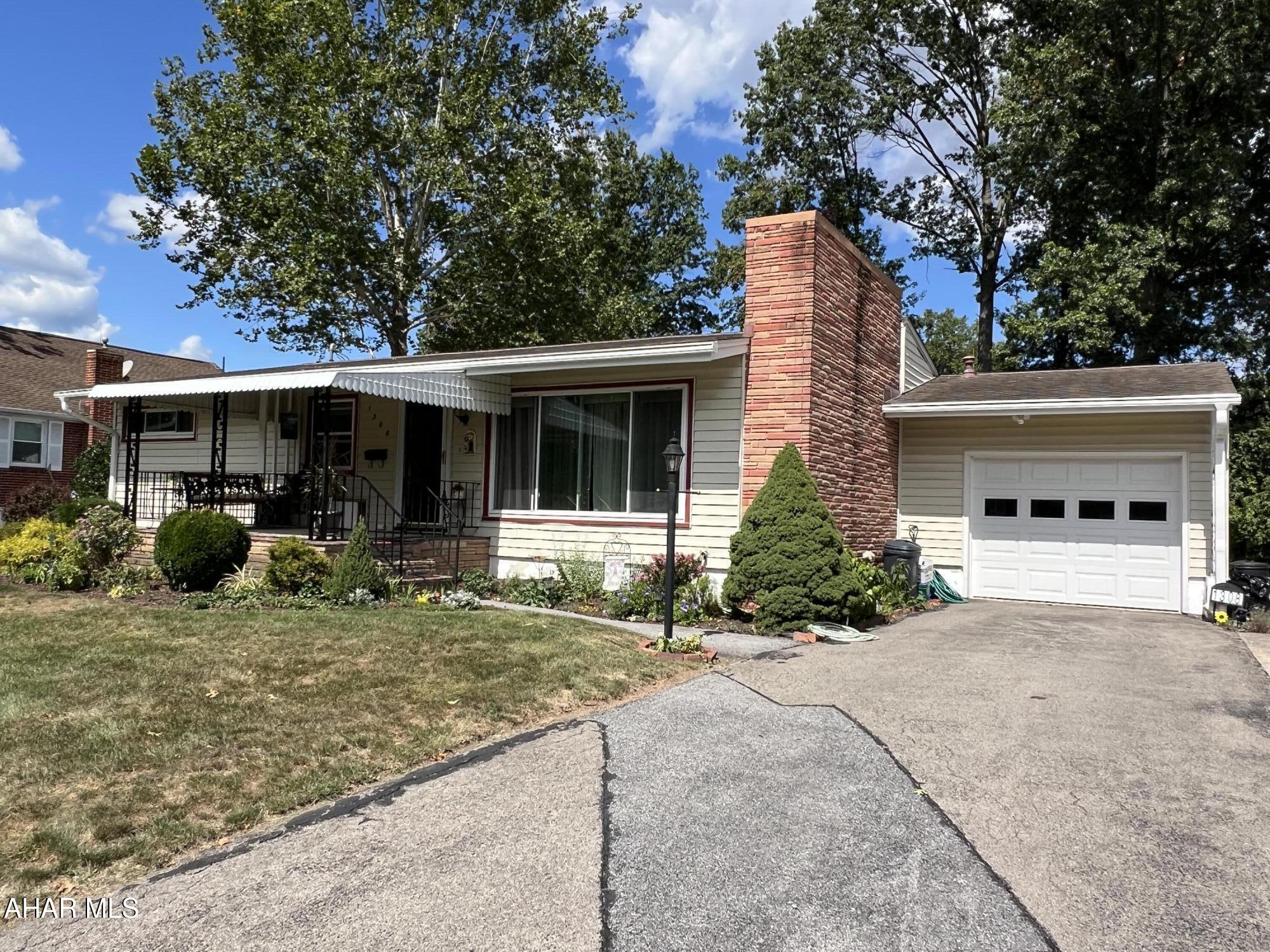 Whether downsizing or looking for your first home, make sure you take a look at this adorable ranch in Hollidaysburg borough in a desirable neighborhood, close to schools and the library. Enjoy the benefits of one-story living with 2 bedrooms, an updated bath and first floor laundry. Bonus room was previously a 3rd bedroom and provides a large office space. Could easily be turned back into a bedroom if needed. Additional features include hardwood floors throughout, one car garage, central air, private rear patio and a spacious 12x20 shed. Schedule an appointment to see this home before it's gone!