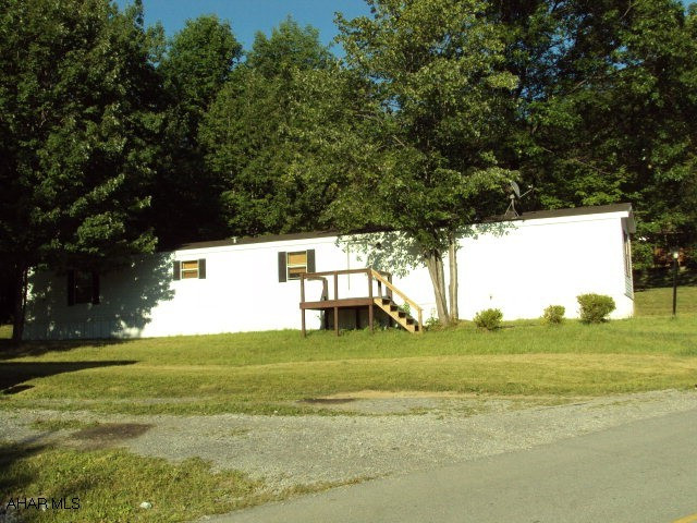1994 Liberty mobile home situated on corner lot in Camelot Woods Mobile Home Park.  Has 3 Bedrooms, one is Master Suite.  A total of 2 Bathrooms, carpeting and laminate flooring, 2 decks, central air.  Lot rent is $284/month includes sewer and trash removal.
