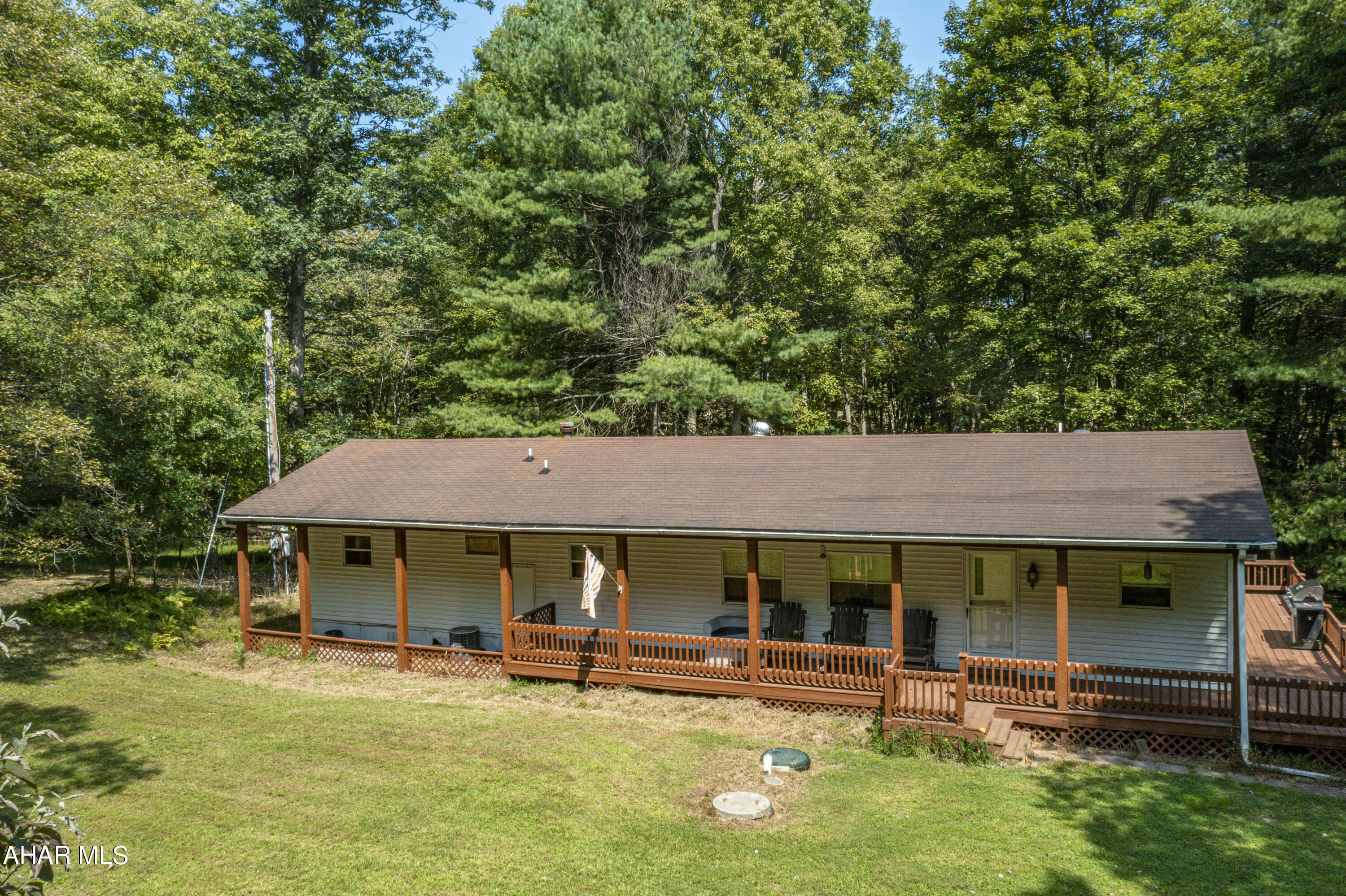 Welcome to your new home or vacation spot in Huntingdon County! It's nestled on 1.59 acres and is only 10 minutes from Lake Raystown Resort, Tatman Run and Trough Creek State Park. This home features 2 bedrooms, a full bath and a half bath located in the master bedroom. The large kitchen is open to the living room. Laundry is located by the full bath . Step outside to the large wood wrap around deck and enjoy the peaceful environment, only steps away from Rothrock State Game Lands. Schedule your tour today.'