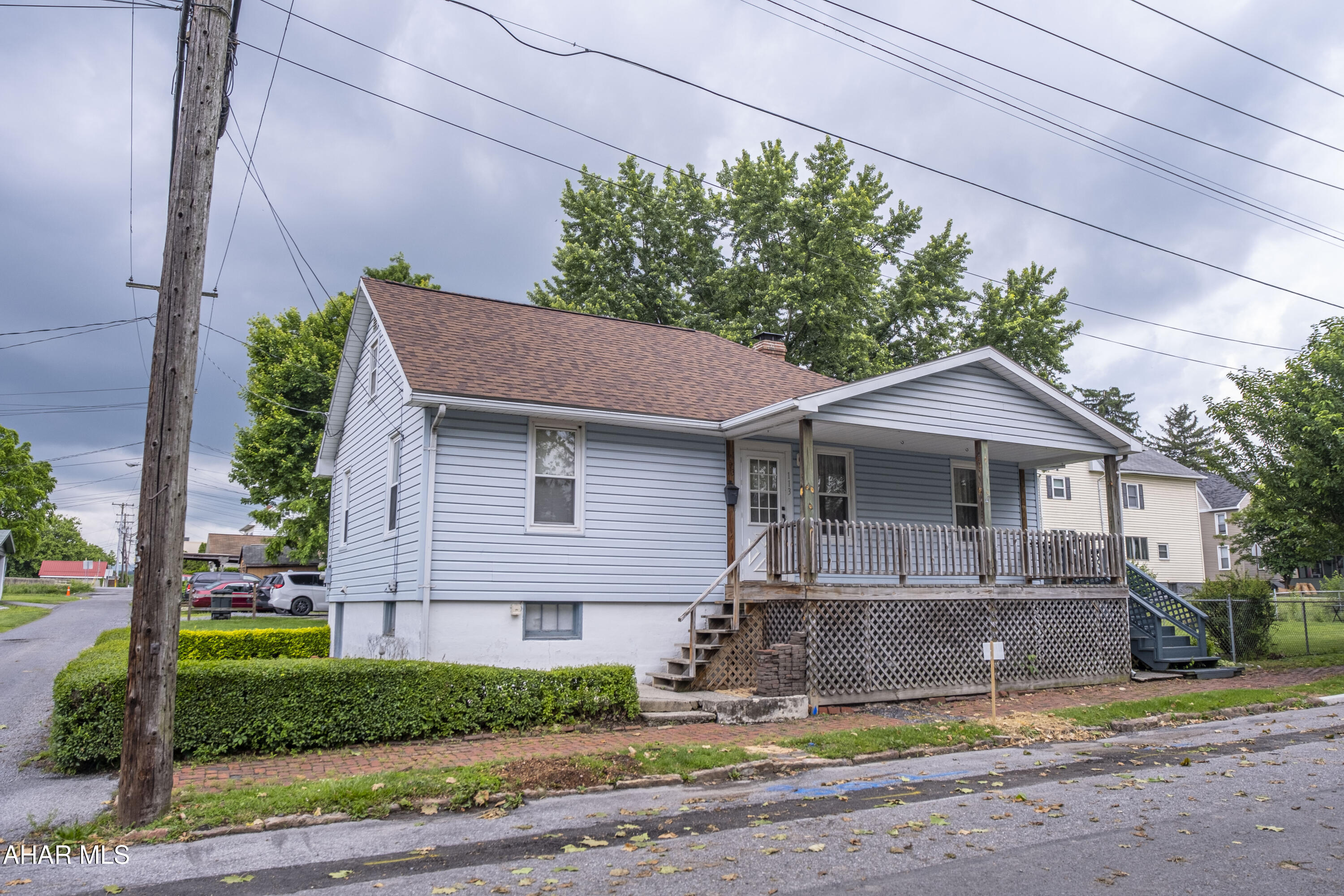 Cute one story home in Borough of Hollidaysburg . Great starter home or investment property. Newer roof, large built in closet in master bedroom. Recently connected to the new borough sewer. Outside enjoy the large side deck and porch or relax in the park like setting in the additional lot included next door. Don't let this one get away!

House being sold AS IS. Seller will not make any repairs.
