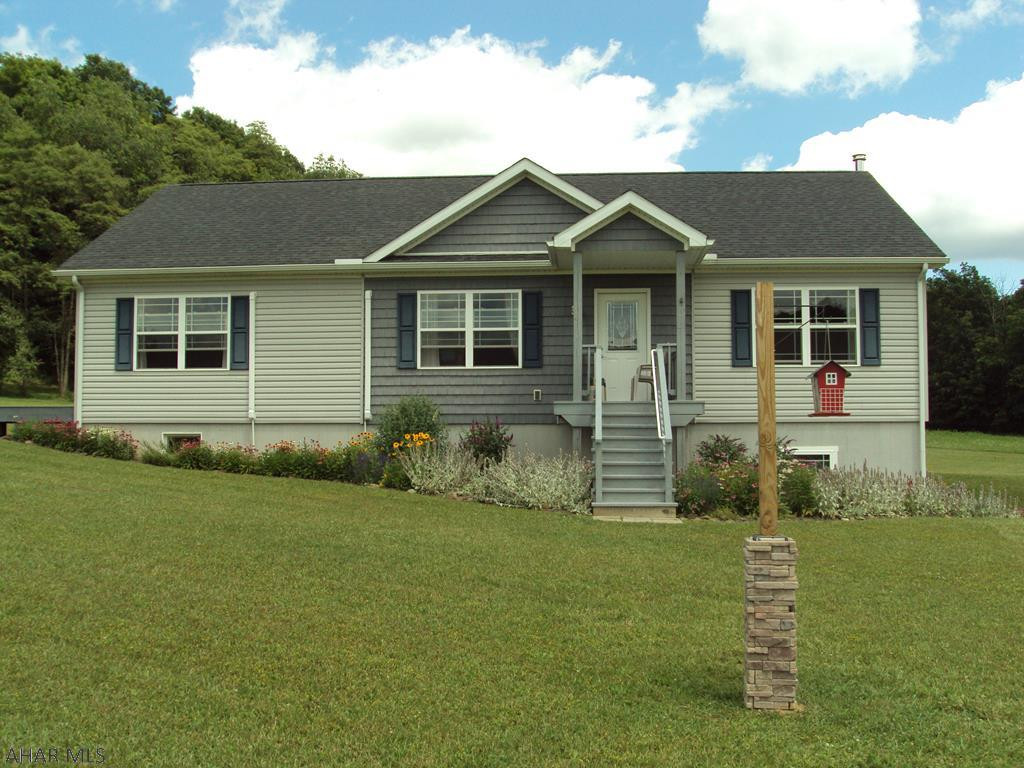 Amazing property nestled against Tussey Mountain.  3 Bedroom 2 Bath with room in lower level to expand if needed.  Country living at its best!  30'x40' pole barn plus outbuilding.  Each room climate controlled.  All on 9.8 secluded acres.