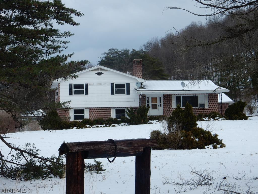 Make this your home with your personal updates and ideas.  This is a multi-level home with a lot of space.  Beautiful setting on 2.28 acres with creek on the property, outdoor fireplace and 3 car brick garage.
