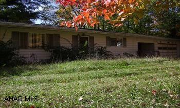 One Story fixer upper on 1 AC w/attached garage. Good flip property-  Nice location.  3 BR- walk out basement- covered patio- Bellwood Schools.