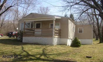 VERY NICE 2 BEDROOM RANCHER ON QUIET SIDE STREET, DOUBLE SIZED LOT, HARDWOOD FLOORS, SCREENED IN PORCH, ABOVE GROUND POOL, CENTRAL AIR.  PRICE REDUCED!  OWNER WELCOMES OFFERS.