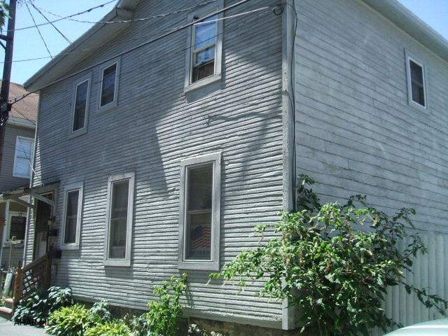 Great investment opportunity! Currently being rented, tenant has occupied the property for many years. Nice side yard & porch.