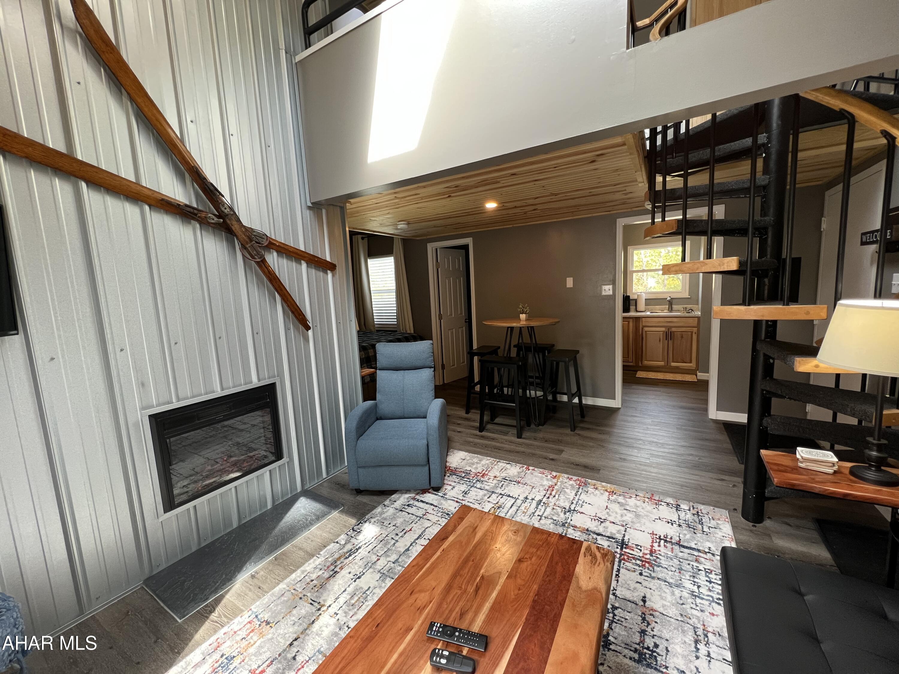 Luxurious loft in the Allegheny Mountains at Blue Knob All Seasons Resort has everything you need. Remodeled and fully furnished. New kitchen cabinets countertops, windows, sliding door, flooring, fireplace, Whirlpool stainless appliances and so much more. Walking distance to indoor pool/hot tub, outdoor pool and The Club House Bar & Grille. Blue Knob is the 2nd highest mountain and highest skiable mountain in Pennsylvania! In addition to an array of winter activities, Blue Knob also has a full-service all seasons Conference Center for weddings and events, they also offer golf, swimming and multitude of trails for hiking, running, and mountain biking. Visit https://blueknob.com/activities-events/ to see all the fun events that are happening at Blue Knob. $255.00/ Mo HOA fee includes: pools, hot tub and gym area, tennis and pickle ball courts, building, property maintenance & garbage. *Additional fees apply for conference center, Golf and Skiing