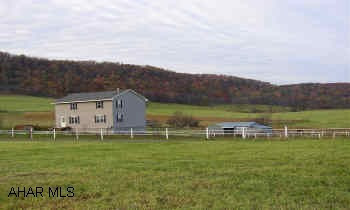 SELLER IS LICENSED REALTOR.  4.9 ACRE FARMETTE WITH SPACIOUS AND OPEN 2 STORY.  INCREDIBLE VIEWS IN SINKING VALLEY.  3 STALL BARN WITH TACK AND HAY STORAGE, RIDING ARENA AND MORE! HOME FEATURES ELEVATED DECK WITH HOT TUB.  MBR WITH JACUZZI AND WALK-IN CLOSETS, PARTIALLY FINISHED BSMT WITH WORKSHOP AND GAS FP.  ALL APPLIANCES STAY.  SEE ADDITIONAL PHOTOS.