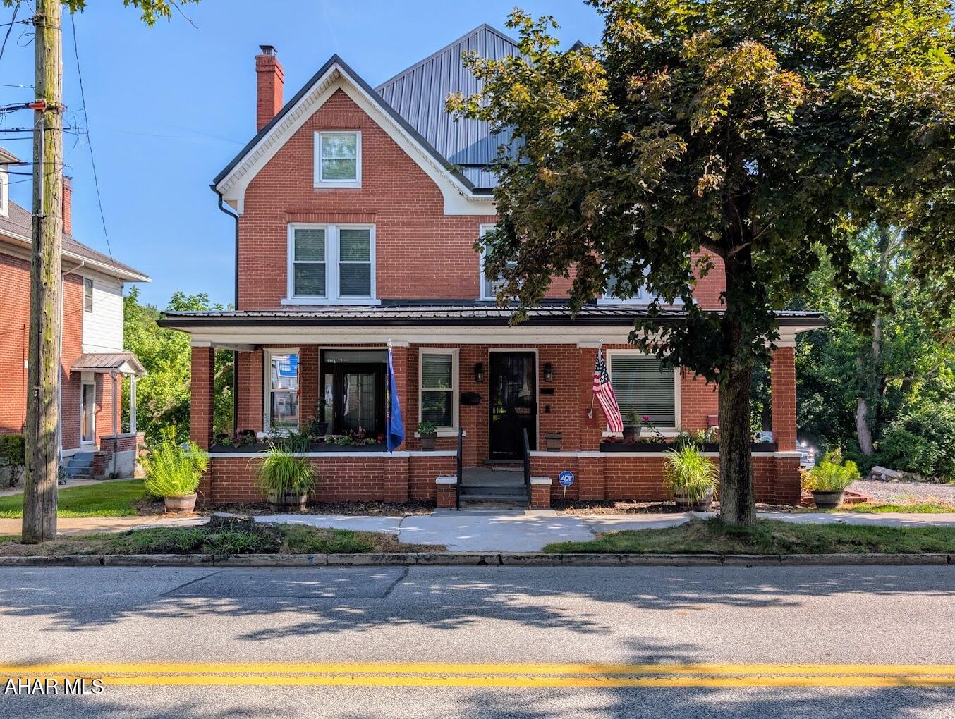 Stunning Restored Everett Borough Beauty on the River

Welcome to your dream home in the heart of Everett Borough—where timeless charm meets modern upgrades! This meticulously maintained and beautifully updated 4 bath, 4-bedroom home (with the potential for a 5th!),  offers comfort, craftsmanship, and curb appeal in every corner.

Step inside this grgeous home that has been restored  and brings you  gleaming hardwood floors, rich trim work that showcases true artisan detail, beautiful built in's, and charming covered hot water radiators. The spacious living room features a new cozy pellet stove, while two of the upstairs bedrooms offer the ambiance of electric fireplaces—perfect for chilly Pennsylvania nights. Newer windows, new front and rear railing, new storm door, new front door, and appliances.,  With 2 full bathrooms and 2 additional half baths, convenience is built right in.

The home's systems have been thoughtfully updated: a new boiler  and domestic hot water heater (2021), new electrical panel and wiring, new plumbing, wraparound water protection system, two-stage large water filtration, and two sump pumps ensure peace of mind. Downstairs, the basement includes a shower, sink, and is plumbed for a toilet—offering expansion potential or a perfect workshop space.

Outside is just as impressive: a covered front porch perfect for morning coffee, back deck overlooking the water, a newer storage shed, fruit trees, carport, wood fencing, and even a workshop for all your projects. And the backyard extends right to the river—a serene, scenic setting for entertaining, relaxing, or simply enjoying nature.

This home truly has it all—style, space, smart upgrades, and a slice of waterfront living in a walkable borough location.